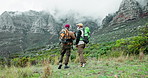 Handshake, hug and success with senior friends outdoor in mountain together for adventure, hiking or hobby. Celebration, motivation and fitness with elderly men in nature for morning exercise