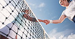 Shaking hands, friends and tennis players on court for match, training or cardio workout together. Sports, well done and female athletes with handshake for thank you at badminton game from below.