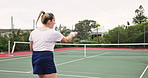 Woman, tennis and court with fitness, ball and training with sunshine, exercise and activity. Person, outdoor and player with racket, practice and competition with hobby, energy and recreation