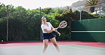 Woman, tennis and court with fitness, cardio and training with sunshine, exercise and activity. Person, outdoor and player with racket, practice and competition with hobby, energy and recreation