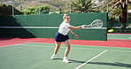 Woman, game and tennis court with fitness, sports and training with sunshine, exercise and contest. Person, outdoor and player with racket, practice and competition with hobby, energy and cardio