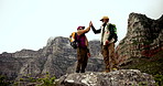 Men, friendship and high five on mountain for support, achievement and fitness goal. Mature people, teamwork and gesture in nature for success, wellness and hiking together for solidarity or health