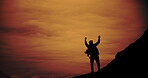 Man, hike and orange sky with success shadow, silhouette and adventurer for fitness with backpack. Nature, challenge and sunset for wellness, victory exercise and achievement on rocks with horizon