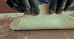 Hands, chef and shape pizza dough for baking, cooking and catering in restaurant kitchen closeup. Bread, person and kneading flour for production process, meal prep and manufacturing Italian cuisine