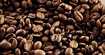 Organic, sustainable and beans for coffee production with fresh granules for texture. Natural, caffeine grains and explosion of fresh brown seeds for beverage of espresso, latte or cappuccino.