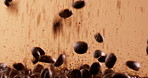 Fresh, roast and falling beans for coffee production with sustainable granules in studio. Natural, caffeine grains and explosion of organic brown seeds for beverage of espresso, latte or cappuccino.