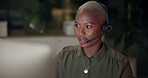 Black woman, virtual call and headset with computer, office and night as multilingual support agent. Female person, tech and communication for international contact center, conversation and help desk