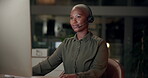 Black woman, talking and headset with computer, office and night as multilingual support agent. Female person, technology and virtual call for international contact center, conversation and help desk