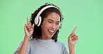 Woman, dancing and green screen or headphone in music, streaming and radio station with energy movement in studio. Happiness, track and audio listening on tech with connection, online and good mood