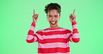 Woman, face and pointing up on green screen of announcement direction, promotion news or advertising sale. Excited, female person and finger gesture of coming soon, brand launch or studio background