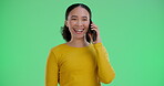 Woman, smile and talking with phone call on green screen for communication, networking and happy news of contact. Female person, mobile and online conversation, chat and internet on studio background