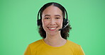 Studio, woman and headset in green screen for online education and distance learning as english tutor or teacher. Female person, portrait and happy or smile with confidence for virtual teaching