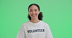 Volunteer, smile and woman in green screen, portrait and happy for donation to charity and community service. Banner, mockup and person with kindness in studio background, space and non profit