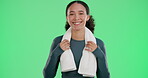 Happy woman, portrait and towel on green screen for fitness, wellness and healthy lifestyle in studio. Female person, sweat cloth or smile on chroma key for exercise, energy or young personal trainer