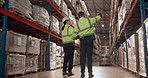 Business people, walking and warehouse with stock for inventory, maintenance or logistics. Back view of man and woman in supply chain for inspection or monitoring of export, import or shipping goods