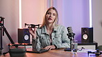 Woman, studio and microphone with helicopter on podcast or broadcast for technology chat as content creator. Presenter, hosting and portrait with online talk show for advice with live streaming