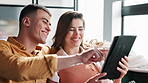 Couple, tablet and laughing on sofa in home networking on social media, mobile app or internet. Man, woman and browse with comic, funny joke or online meme with technology in living room at house