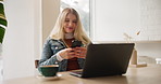 Woman, laptop and phone in cafe for reading text, communication and work break with coffee. Female person, computer and mobile for email notification, freelance career and internet scroll with latte