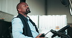 Stress, man and logistics worker in forklift for goods transportation with stock crisis or mistake. Upset, burnout and African male supply chain distributor in vehicle at warehouse for cargo freight.