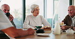 Lunch, talking and mature group in house, reunion and cake for tea party, drink and dining room. Home, chat and elderly people in retirement, coffee and conversation with friends for nostalgia