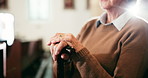 Church, prayer and senior woman with walking stick in chapel for praying, worship and Sunday service. Retirement, religion and person with disability for faith, spiritual congregation and grace