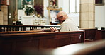 Bench, prayer and senior man in church with faith, gratitude and spiritual respect in meditation. Praise, religion and elderly person in Christian chapel with reflection, morning worship and peace