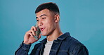 Man, money phone and talk in studio, funny conversation and pride for investment on blue background. Male person, speaking and pretend call for wealth, confidence and conversation for cash growth