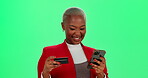 Credit card, phone and woman on green screen for ecommerce of bargain or sale in studio. App, fintech and online shopping with happy African customer on mockup for payment, purchase or retail