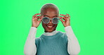 Black woman, green screen and happy for fashion with sunglasses for trendy style, outfit and clothes. Female person, mockup space and smile or laugh with excitement for streetwear and  sun protection