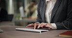 Hands, computer and person typing for business research, networking and administration in office. Receptionist, technology and writing email in workplace for corporate report, planning and schedule
