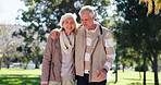 Retirement, senior couple and walking in park for bonding, romance or summer love with smile. Conversation, funny or laughing with elderly an and woman in green garden of assisted living home