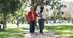 Happy, walking and senior couple in park for bonding, relationship and relax together. Love, retirement and mature man and woman outdoors together for wellness, health and commitment in nature