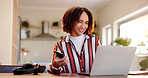 Happy woman, laptop and online shopping with credit card for payment, transaction or banking on table at home. Young female person or shopper with smile, computer or debit for fintech or ecommerce