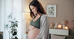 Belly, pregnancy and thinking with woman in living room of home for maternal health or wellness. Future, idea and smile with happy pregnant person in apartment, ready to start family as mother