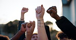 Fist, outdoor and power to group, protest and riot of university students for human rights in school. Strong, crowd and fight for end of racial injustice, politics and college people in USA and union