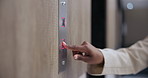 Business, worker and hand for button by lift for activating or elevator usage and request floor in office building. Closeup, person and pressing in morning by workplace for management career.