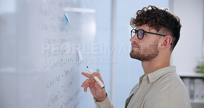 Guy Coding Script Man, coding and reading on whiteboard in office for review, system ...