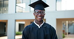 Happy black man, graduation and robe with confidence at university for education, learning or milestone at campus. Portrait of young African, male person or graduate and student with smile for future