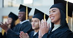 Happy woman, applause and graduation with students for congratulations, ceremony or milestone at campus. Group of people, graduate or class clapping with smile in education, learning or qualification