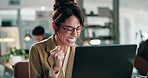 Woman, celebration and computer at office in night with surprise, smile or excited for success. Person, happy and wow for cheers, winner and goal in competition, bonus or investing at creative agency