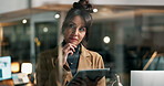 Woman, reading and thinking with tablet at office for scroll, night and decision for problem solving at job. Person, touchscreen and app with smile, ideas or research for solution at creative agency