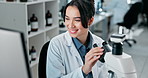 Woman, science and computer by microscope in lab at pharmaceutical company with smile. Person, pc and data for results, happy and review for research in medicine, drugs or vaccine with lens for virus