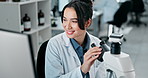 Woman, scientist and computer by microscope in laboratory at pharmaceutical company with smile. Person, pc and data for results, happy and review for research in medicine, drugs or vaccine for virus