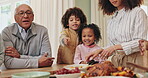 Family, thanksgiving and food with children, buffet and table for reunion, celebration and holiday. Social gathering, people and happy for gratitude and brunch with gourmet meal, event and feast