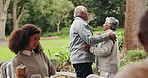 Senior, couple and dance in garden at family reunion for celebration together with fun. Happy woman, outdoor and smile with holding hands, care and love in backyard at anniversary party and event