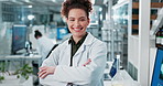 Scientist, woman and smile with arms crossed in laboratory for confidence with healthcare, laughing and biotech job. Scientist, professional and portrait for medical research and vaccine development