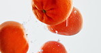 Fruit, orange and water with vitamin c for nutrition, fresh produce or hydration in studio on a white background. Closeup of juicy, natural organic food or citric acid in wet splash for healthy diet