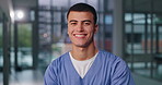 Portrait, man and happy nurse in clinic for healthcare service, wellness or medicine career in Spain. Face, confidence and medical surgeon laugh with worker, doctor and employee in hospital for job