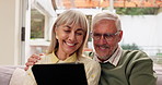 Senior, happy couple and relax with tablet on sofa for streaming entertainment, video and movie on weekend. Elderly man, woman and together in home with internet for bonding and social network app.