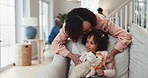 Mother, girl and kiss child in home, love and affection for support in bonding. Mom, daughter and teddy bear for safety in connection or trust, talking and kid for security in relationship to relax